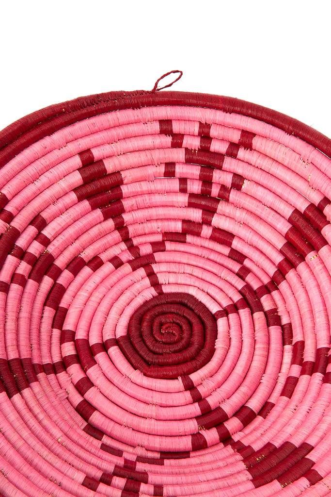 Handwoven sisal coiled Uganda raffia basket, sisal wall basket